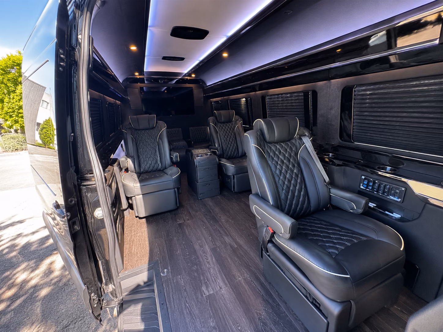 ithaca sprinter van with driver inside